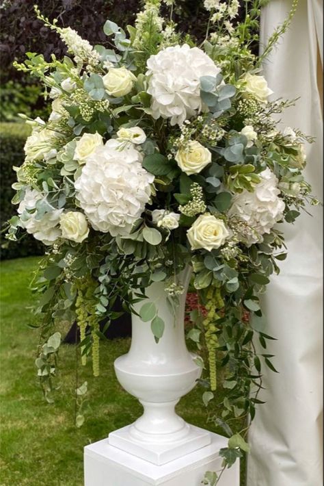 Simple Fancy Wedding Decor, Column Floral Arrangements, Urns With Flowers, Floral Arrangements On Pedestals, Formal Wedding Flower Arrangements, Ceremony Flowers On Pedestals, Big Flower Arrangements Wedding, Wedding Alter Flowers Pillars, Wedding Flowers Whimsical