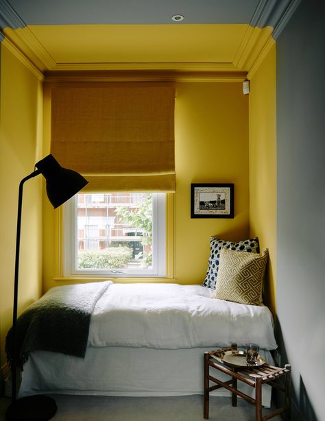 [link url="https://www.stylelibrary.com/sanderson/"]Sanderson[/link]'s 'Mimosa Yellow' paint brightens one of the bedrooms. Very Small Bedroom, Tiny Bedroom Design, Yellow Bedroom Decor, Yellow Room, Small Space Design, Yellow Bedroom, Small Bedroom Decor, London House, Small Room Design