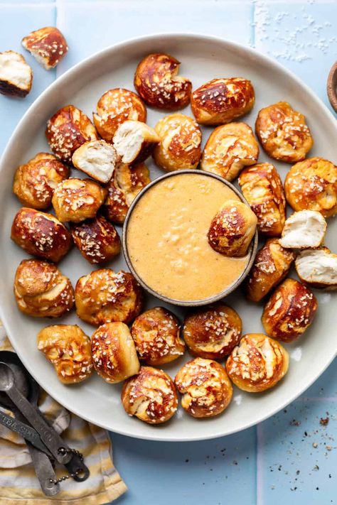 This soft pretzel recipe is perfect for game day, served with homemade beer cheese that’ll have your tastebuds singing! Make this savory snack to serve or anytime the craving strikes. Pretzel And Beer Cheese Dip, Pretzel And Beer Cheese Recipe, Beer Cheese And Pretzels, Beer Cheese Sauce For Pretzels, Pretzel Board Ideas, Pretzels And Beer Cheese Recipe, Pub Pretzels Recipe, Pretzel Bites And Beer Cheese, Pretzel With Cheese