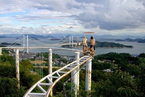 Located in Washuzan Highland Amusement Park in Okayama city in Japan, the Sky Cycle is a pedal-powered roller coaster that requires riders to pedal all the way around, rather than just sit back and enjoy. The roller coaster is built over a hilly terrain and consists of a pair of elevated rails. The carts that ride the roller coaster looks like side by side tandem bikes, with baskets in the front for storing belongings, and brakes just like in a real bicycle... Sky Bike, Okayama, Highland Park, Travel Inspo, Adventure Awaits, Fun Fact, Roller Coaster, Travel Bucket List, Travel Bucket