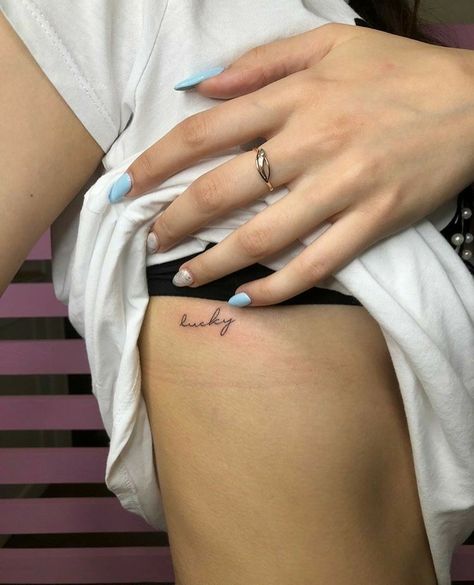 Small Rib Tattoos, Lucky Tattoo, Rib Tattoos For Women, Small Girly Tattoos, Cursive Tattoos, Ribcage Tattoo, Small Girl Tattoos, Cat Tattoos, Disney Tattoo