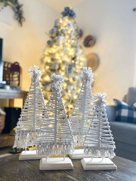 DIY Macrame Christmas Trees. DIY Christmas decorations on a budget. These trees add a perfect touch to any Christmas scene. This project may look difficult, but following the steps should help you make your own trees  My inspiration came from Hobby Lobby. They have macrame Christmas trees that are already made but can cost $$$ if you wanted more than one like I did. This method will allow you to create as many as you want for a pretty inexpensive price. Macrame Tree Table Top, Table Top Macrame Christmas Tree, Macrame Trees Diy, Yarn Macrame Christmas Tree, Tabletop Macrame Christmas Tree, Macrame Xmas Trees, Tabletop Macrame Tree, Thanksgiving Macrame Ideas, Christmas Tree Macrame Diy