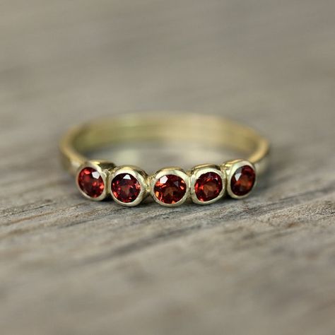 Crimson Red Garnet and Recycled 14k Yellow Gold by onegarnetgirl Yellow Gold Anniversary Band, 5 Stone Ring, Gold Anniversary Bands, Garnet Engagement Ring, Emerald Cut Diamond Engagement, Gold Anniversary, Twisted Band, Crimson Red, Red Diamond