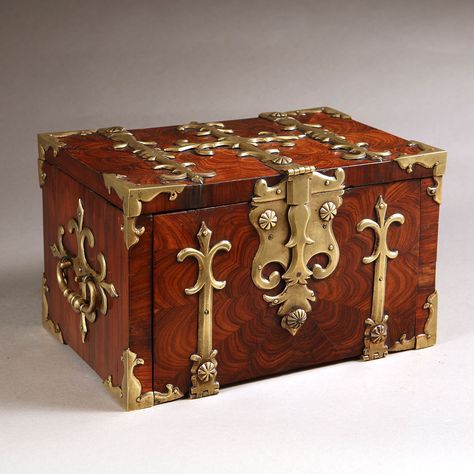 A 17th century Kingwood strongbox with gilt brass straps. This strongbox has to be one of the most charming and certainly the smallest example we have encountered, at just 17.5 cm high, 28 cm wide and 18 cm deep. Wrapping Inspiration, Old Trunks, Antique Trunk, Gift Wrapping Inspiration, Trunks And Chests, Vintage Trunks, William And Mary, Box Chest, Antique Boxes