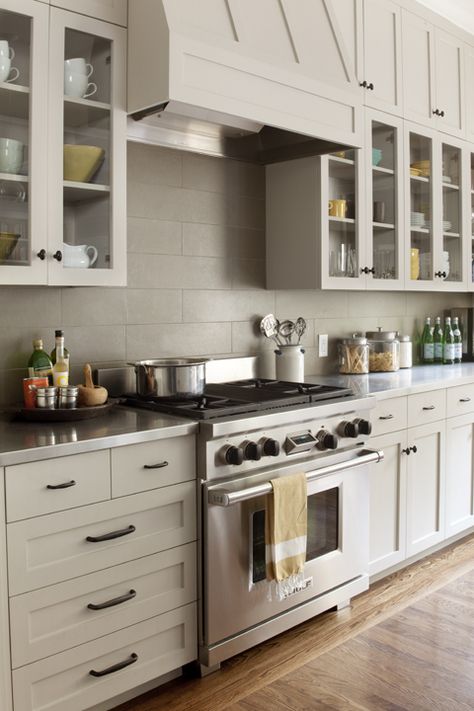 Subway tile backsplash and glass cabinets. Valley Kitchen, Steel Countertops, Kitchen Backsplash Trends, Taupe Kitchen, Subway Tile Backsplash Kitchen, Best Kitchen Cabinets, Subway Tile Kitchen, Gray Cabinets, Large Tile