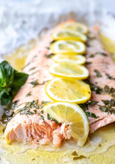 If you're looking for a new twist on your baked salmon dinner, try this Lemon Basil Salmon Recipe. A simple combo of lemon, fresh basil and butter makes this meal extra flavorful. Substitute olive oil for the butter and you have a dairy free version.This recipe is low carb, Keto friendly, gluten free with Whole30 Paleo option. #ketorecipes #salmonrecipes #dinnerideas #lowcarbrecipes #ketodiet #healthydinnerrecipes Salmon Basil Recipes, Salmon Basil, Basil Salmon, Mango Quinoa Salad, Mango Quinoa, Foil Recipes, Appetizers Crockpot, Healthy Dinner Ideas Easy, Vegan Green Bean Casserole