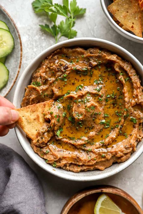 This Roasted Eggplant Dip is the perfect healthy appetizer! It's made with a savory blend of roasted eggplant, tomato, onion, and garlic blended until creamy, then finished with a squeeze of lemon. Serve with homemade crackers or fresh veggies! Tomato Dip Recipes, Eggplant Dip Recipes, Eggplant Appetizer, Roasted Eggplant Dip, Healthy Eggplant, Healthy Appetizer, Eggplant Dip, Garlic Dip, Roasted Eggplant