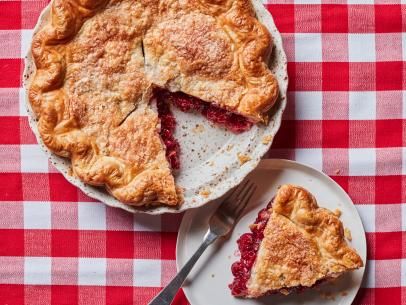 Cherry Pie Recipe | Food Network Fresh Cherry Pie Recipe, Fresh Cherry Pie, Cinnabon Rolls, Cherry Pies, Cherry Pie Recipe, Pie Dough Recipe, Fruit Pies, Dessert Places, Cherry Cobbler