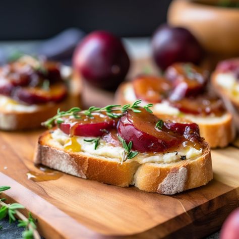 This recipe is a perfect fusion of sweet and savory flavors that meld together in the most delicious way possible. The combination of juicy plums, creamy brie, and aromatic spices creates a unique and flavorful appetizer that is sure to impress your guests. #Food #Recipe #Crostini #Plum #Brie #Entertaining #Friends #Delicious Plum Appetizer Recipes, Plum Recipes Savory, Cranberry Crostini, Brie Appetizers, Bruchetta Appetizers, Brie Crostini, Creamy Brie, Brie Cranberry, Brie Appetizer