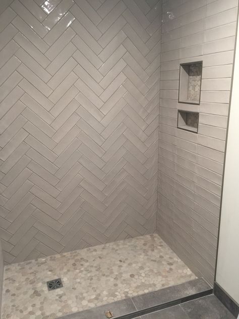 2 Toned Shower Tile, Herring Bone Bathroom Tile, Two Tone Subway Tile Bathroom, Chevron Tile Bathroom Shower Walls, Chevron Subway Tile Bathroom, Light Grey Herringbone Tile Bathroom, Herringbone Shower Tiles, Small Bathroom Herringbone Tile, Shower With Herringbone Tile