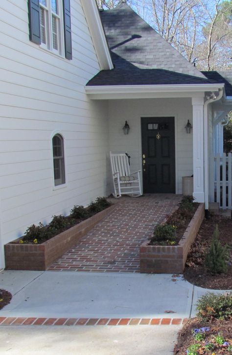 Vaughan Building & Remodeling created this front entry with ramp using brick pavers that were recycled from the old patio in the rear Brick Ramp Front Porches, Home Wheelchair Ramp, Front Porch Wheelchair Ramp Ideas, Wheelchair Ramp In Garage, Wheelchair Accessible Front Door, Wheelchair Accessible Pathways, Wheelchair Ramps For Home, Porch With Ramp, Wheelchair Ramp Design