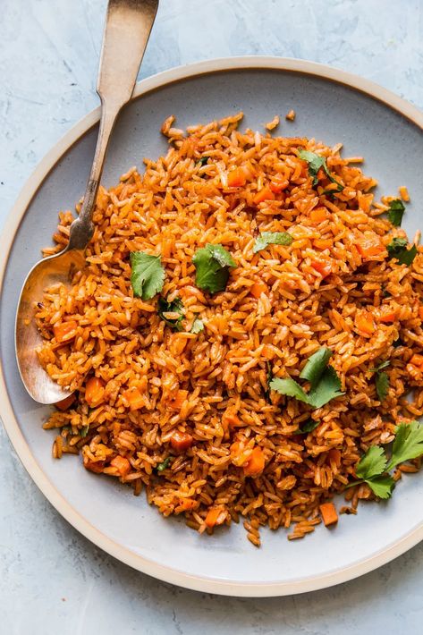 This savory, tomato-tinged, restaurant-style Mexican rice recipe could not be easier, and makes a killer side dish (just add beans!) or burrito filling. Homemade Mexican Rice, Burrito Filling, Mexican Rice Recipe, Mexican Rice Recipes, Restaurant Inspired Recipes, The Modern Proper, Modern Proper, Vegetarian Mexican, Homemade Mexican