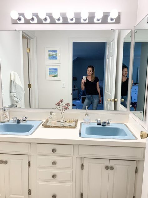 Simple bathroom organization solutions | Building Bluebird #retrobathroom #bluetile #storage #vintage Retro Blue Bathroom Update, Retro Blue Tile Bathroom Ideas, Vintage Blue Bathroom, Blue 60s Bathroom, Blue Bathroom Suite Retro, Blue 1950s Bathroom, Easy Bathroom Organization, Blue Shower Tile, Bath Makeover