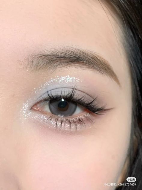 Makeup Ideas For A Light Blue Dress, Snow Makeup Looks Simple, Glitter Makeup Hooded Eyes, Quince Makeup Ideas Natural Blue, Glitter Eye Makeup Hooded Eyes, Euphoria Makeup Hooded Eyes, Soft Blue Makeup Looks, Dusty Blue Makeup Look, Douyin Makeup Hooded Eyes