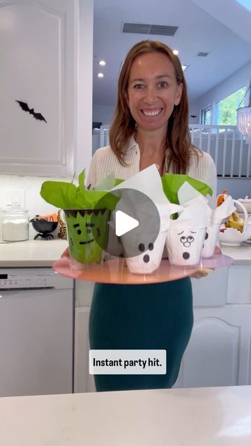 Shannon Doherty on Instagram: "HALLOWEEN SNACK CUPS DIY!!👻🎃 SAVE this easy idea for your Halloween parties this year!! Super Easy and makes every party that much spookier!!👻   LIKE + COMMENT - “ghost” - for links to all the supplies to make these! Linking the napkins and cups for you! Make sure you are following me to get the links!  I love sharing these easy ideas that I know you can actually do and that you will love!! Happy Halloween!! Love you guys! Xo #halloween #halloweendiy #halloweentreats #halloweencrafts #easydiy #diy #halloweenparty #halloweenpartyideas #momhack #momsofinstagram" Ghost Cup Stacking Game, Cup Ghost Craft, Spooky Cups Diy, Halloween Plastic Cup Ideas, Ghost Candy Bowl, Snack Cups, Mom Hacks, Diy Cups, Halloween Snacks