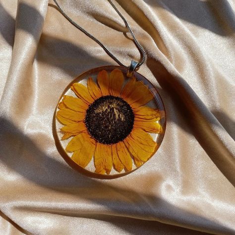 Ebong(এবং) । Resin ~ Nature on Instagram: “🌻Sunflower Neckpiece and Sunflower Ring🌻 Much awaited drop🌻 Get yourself a forever sunflower🌻 Sunflower lovers show some love ❤️ . . . .…” Resin Sunflower, Sunflower Ring, Sunflower Necklace, Resin Jewellery, Resin Jewelry, Resin Art, Diy Art, Washer Necklace, Sunflower