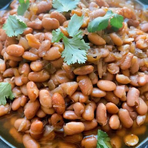 Try this easy Chipotle pinto beans recipe in the Instant Pot for a quick and flavorful dish. Make restaurant-quality copycat chipotle pinto beans at home with smoky chipotle peppers and adobo sauce. Perfect as a side dish or in burrito bowls. Get the recipe now! Chipotle Copycat Pinto Beans, Chipotle Pinto Beans Copycat, Chipotle Pinto Beans, Pinto Beans Recipe, Copycat Chipotle, Pinto Bean Recipes, Chipotle Seasoning, Chipotle Peppers, Ancho Chili