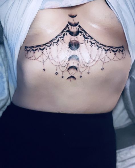 Viking Chest Tattoo Female, Witchy Underbust Tattoo Ideas, Witchy Underboob Tattoo, Middle Of The Chest Tattoo Women, Gothic Underboob Tattoo, Gothic Sternum Tattoo, Sternum Underboob Tattoo, Witchy Chest Tattoo, Witchy Sternum Tattoo