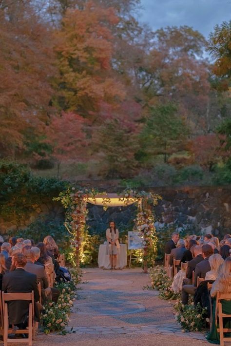 Autumn wedding ceremony with floral chuppah under colorful fall foliage and soft twilight light. Autumn Wedding Ceremony, Elegant Floral Arrangements, Autumnal Wedding, Mountain Destinations, Colors Of Autumn, Ceremony Inspiration, Beautiful Autumn, Autumn Wedding, Industrial Wedding