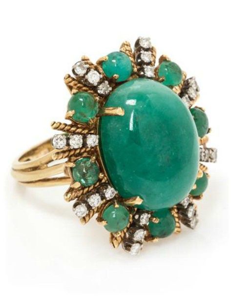 A fabulous vintage cocktail ring with a huge cabochon emerald surrounded by smaller emeralds and diamonds. December Jewelry, Vintage Cocktail Rings, Emerald Cabochon, Vintage Cocktail Ring, Retro Jewelry, Vintage Cocktail, Deco Jewelry, Emerald Jewelry, Art Deco Jewelry