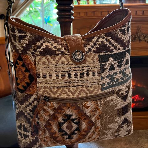 New Myra Saddle Blanket Tapestry Leather Trim Crossbody Shoulder Bag Materials Canvas, Tapestry, & Leather Item Width 15 Item Depth 3.5 Item Height 14 Shoulder 22 Item 1980-23 Saddle Blanket Bag, Canvas Tapestry, Myra Bags, Blanket Bag, Blanket Tapestry, Fringe Crossbody Purse, Crossover Purse, Crossbody Clutch Purse, Upcycled Bag