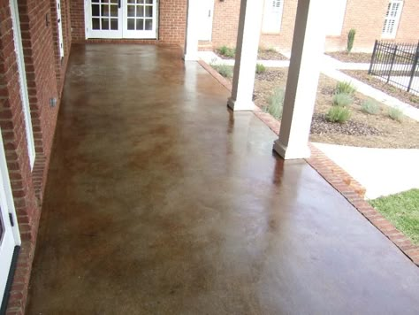 7 Ways to Add Character to a Concrete Porch • Our Storied Home Stained Concrete Porch, Concrete Stain Patio, Concrete Stain, Brick Patio, Concrete Stained Floors, Building A Porch, Porch Flooring, Concrete Porch, Brick Patios