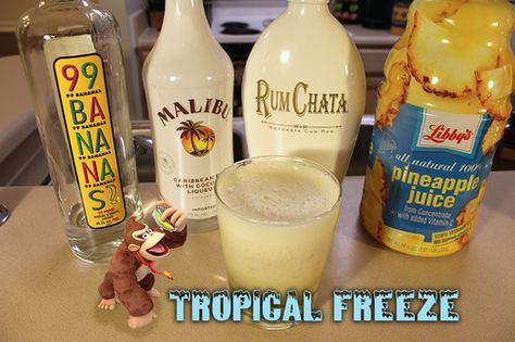 Ingredients: .75 oz 99 Bananas, .75 oz Malibu Rum with Coconut, .75 oz RumChata, 4 oz Pineapple Juice, Ice. 99 Bananas, Tiara Tattoo, Rumchata Recipes, Malibu Cocktails, Crown Apple, Rum Drinks Recipes, Malibu Drinks, Apple Drinks, Banana Drinks