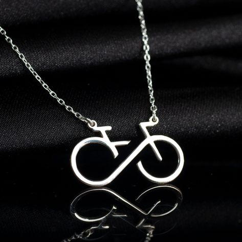 Infinity Bicycle Necklace, Sterling Silver Bicycle Pendant is made by hand in our workshop with care. All our jewelry is the most elegant choice for the Bridesmaids, friends, your loved ones and for yourself.  Infinity Bicycle Necklace, Sterling Silver Bicycle Pendant * Material: High Quality Solid 925 Sterling Silver. * Finish: Sterling Silver ∙ Gold ∙ Rose Gold. * All our jewelry is custom made by hand with care in our workshop.  HOW TO ORDER ❓ * Select your necklace COLOR. * Choose necklace l Bike Necklace, Bicycle Necklace, Bike Jewelry, Bike Gift, Silver Jewelry Design, Inspired Jewelry, Necklace Sterling Silver, Sterling Silber, Solid 925 Sterling Silver