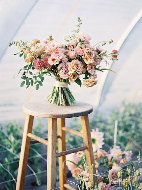 Such beautiful gestures in this bouquet of dusty pinks, corals, and mauves. Erin Benzakein, Neutral Bouquet, Bouquet Styles, Yellow Bridal Bouquets, Flower Farms, Orange Bouquet, A Bunch Of Flowers, Organic Wedding, Pink Wedding Flowers