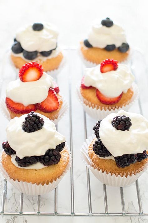 Pound Cake Cupcakes are a perfect excuse to eat cupcakes for breakfast. Light, buttery pound cake topped with berries and whipped cream. Pound Cake Cupcakes, Buttery Pound Cake, Butter Pound Cake, Breakfast Cupcakes, Summer Cupcakes, Eat Cupcakes, Buttercream Cupcakes, Gourmet Cupcakes, Dessert Aux Fruits