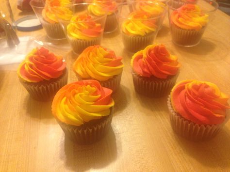 Red/Yellow/Orange swirl cupcakes Flame Cupcakes, Fire Truck Cupcakes, Fire Cupcakes, Saco Maine, Fire Cake, Firetruck Cake, Dessert Design, Yellow Cupcakes, Firetruck Birthday Party