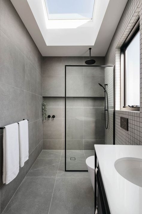 black and grey bathroom interior design scheme for residential development in the inner north of Melbourne by C.Kairouz Architects Concrete Bathroom Ideas, Polished Concrete Bathroom, Bathroom Concrete Floor, Grey Scheme, Monochromatic Bathroom, Grey Bathroom Interior, Light Grey Bathrooms, Polished Concrete Floors, Grey Bathroom Tiles