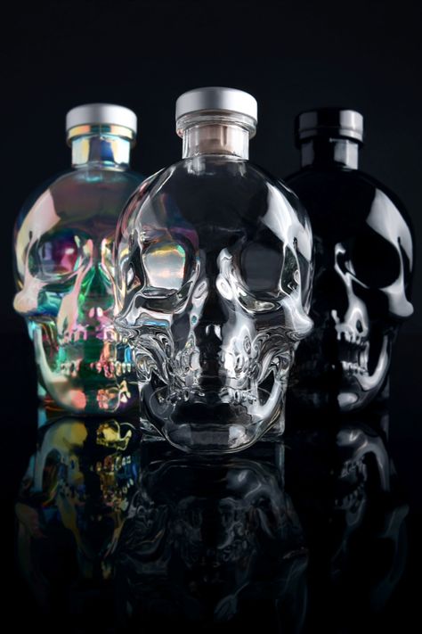 The three Crystal Head expressions: Crystal Head Vodka, crafted from Canadian corn. Crystal Head Aurora, crafted from English wheat. Crystal Head Onyx, crafted from Blue Weber agave. Crystal Head Vodka, Premium Vodka, Drinks Alcohol, Citrus Oil, Liquor Bottle, Liquor Bottles, Our Story, Product Photography, Sugar Skull