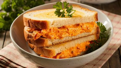 If you're a fan of Joanna Gaines' culinary creations or simply crave a taste of Southern comfort, her pimento cheese sandwich is a must-try delight. This Southern Pimento Cheese Recipe, Southern Pimento Cheese, Pimento Cheese Sandwich, Pimento Cheese Recipe, Tzatziki Chicken, Joanna Gaines Recipes, Pimento Cheese Dip, Pimento Cheese Sandwiches, Pimento Cheese Spread