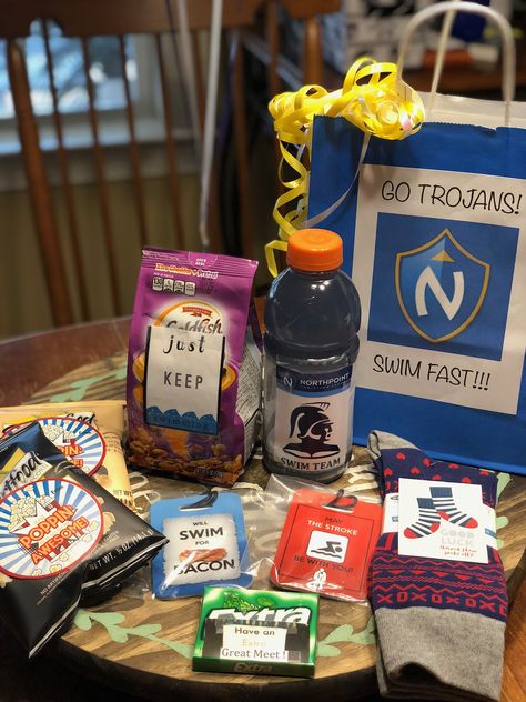 Swim goodie bag for State Championship Meet State Championship Goodie Bags, Swim Team Gifts Treats, Gifts For Swimmers Diy, Swim Goodie Bags, Swim Buddy Gift Ideas, Swim Team Gift Bags, Swim Team Goodie Bags, Swim Meet Bag Essentials, State Swim Meet Gifts