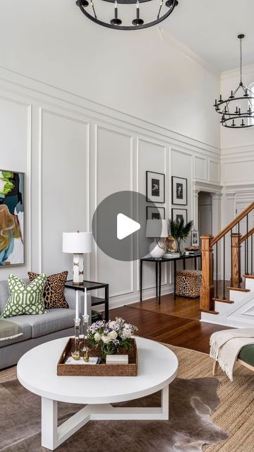 Erika Ward Interiors on Instagram: "Tall ceilings can be intimidating if you’ve got a big blank wall staring you in the face. We transformed this room with stunning trim moldings! 🌟 These timeless details elevate any room, adding classic elegance and boosting your home’s resale value. Invest in style that lasts! 🏡✨ #HomeDecor #TimelessDesign #TrimMoldings #HomeImprovement #ErikaWardInteriors" Picture Frame Molding Vaulted Ceiling, Vaulted Ceiling Trim, Tall Wainscoting, Tall Ceiling Living Room, Waynes Coating, Tennessee House, Big Blank Wall, Ceiling Trim, Big Wall Decor