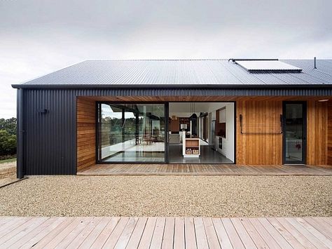 Interesting use of corrugated sheet metal. I cheap material which can look stylish if details are considered. Recessed Windows, Grey Siding, Exterior Wall Cladding, House Cladding, Casa Country, Wood Cladding, Timber Cladding, Shed Homes, Exterior Cladding