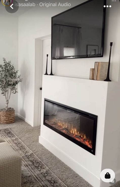 Master Bedrooms Electric Fireplace, Electric Fireplace With Ledge, Tv And Fire Wall Ideas Bedroom, Corner Electric Fireplace Modern, Small Bedroom With Electric Fireplace, Bedroom Electric Fireplace Ideas With Tv, Minimal Electric Fireplace, 77 Inch Tv Living Room, Minimalist Fireplace With Tv