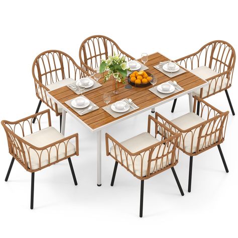 PRICES MAY VARY. Rattan& Wood Solid Construction: Our table combines sturdy steel & plastic wood for lasting durability; Chairs are made of all-weather wicker, built to withstand the elements. All of them are designed to stay pristine for ages. Outdoor Dining Excellence: Unwind with loved ones on our premier patio dining set for 6. Designed for gardens, backyards, and poolside retreats, its allure lies in creating cherished moments, bathed in relaxation. Thoughtful Design: Embrace comfort with e Porch And Balcony, Backyard Porch, Wicker Patio Furniture, Wicker Chairs, Garden Set, Elegant Dining, Patio Dining Set, Wicker Furniture, Table And Chair Sets