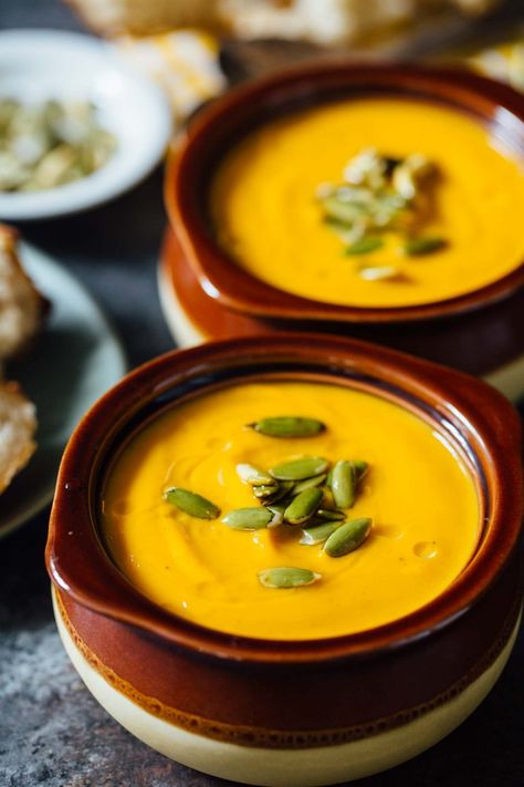 A creamy seasonal soup that you can have year-round. This Instant Pot autumn harvest butternut squash soup is a copycat from Panera that you know and love! #butternutsquash #soup #recipes #souprecipes #panera #paneracopycat #squashrecipes #falleats Squash Soup Instant Pot, Panera Soup, Autumn Squash Soup Recipe, Soup Panera, Autumn Squash Soup, Spicy Butternut Squash Soup, Harvest Soup, Autumn Squash, Bean And Bacon Soup