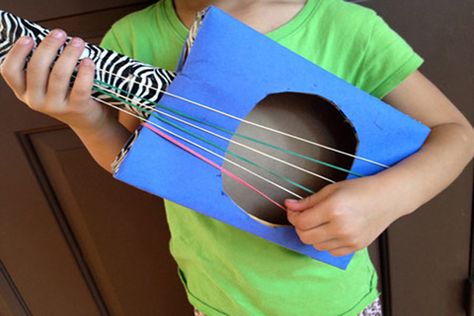 guitar craft for kids | Cardboard Guitars | Crafts for Kids | PBS Parents -- Make your own guitar (give it a electric guitar template over it; duct tape to decorate) Cardboard Guitar, Music Instruments Diy, Instrument Craft, Guitar Crafts, Homemade Musical Instruments, Making Musical Instruments, Homemade Instruments, Duct Tape Crafts, Diy Instruments