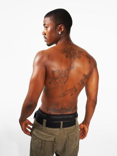 If your upper back tattoo isn't connected to your lower back tattoo, it's still a tramp stamp. J Tattoos, J Raymond Quotes, Thigh Script Tattoo, African American Tattoos, Black People Tattoos, Ray J, J Tattoo, Tramp Stamp Tattoos, Upper Back Tattoos