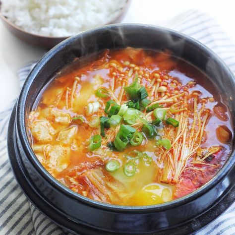 Let us introduce to you one of our favorite Korean dish: soondubu jjigae. For those of you who’ve never heard of it, it is a spicy soup/stew with really soft, silky smooth tofu. It’s often served boiling hot in a clay pot and is eaten with a nice bowl of hot rice. YUM, our mouths are watering...Read More Soondubu Jjigae, Soft Tofu Stew, Jjigae Recipe, Tofu Stew, Soft Tofu, Spicy Soup, Spicy Korean, Korean Dishes, Stew Recipes