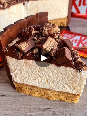 No Bake Kitkat Cheesecake 😍 | No Bake Kitkat Cheesecake 😍

Let's throw it back to this absolutely delicious and chocolatey KitKat cheesecake!
It’s so easy to make and it’s such a... | By Fitwaffle | What's up guys? Today we're
going to be making a Kit Kat cheesecake. First, line your
tin with Kit Kats and set aside. Add crushed digesters
and melted butter to a bowl and mix until combined then scoop
into the tin and press down firmly. Pop this in the fridge
for now. Add double cream to a bowl and whisk to form stiff
peaks. In another bowl, add cream cheese and icing sugar
and whisk until smooth then fold in the whipped cream.
Scoop the mix onto your base, smoothen it out to the edges
then refrigerate for at least five hours. Pour hot cream over
dark chocolate or chocolate chips and mix un Kit Kat Cheesecake No Bake, No Bake Milk And White Chocolate Kit Kat Cheesecake, Kit Kat Cheesecake, Birthday Cake Kit Kat, Chocolate Cake With Kit Kat Around, Air Dry Clay, Melted Butter, Whipped Cream, Dark Chocolate