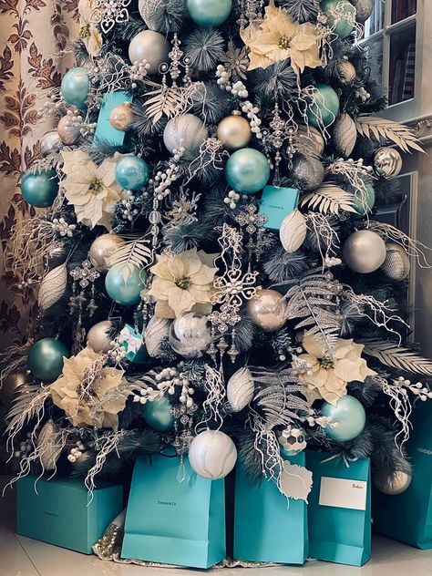 Christmas Tree Teal And Gold, Light Blue Ornaments Christmas Tree, Frosted Christmas Tree With Blue Ornaments, Blue Christmas Astethic, Black And Teal Christmas Tree, Tiffany Blue Christmas Decorations, Teal And Silver Christmas Decor, Tiffany Christmas Tree, Teal Christmas Tree Ideas