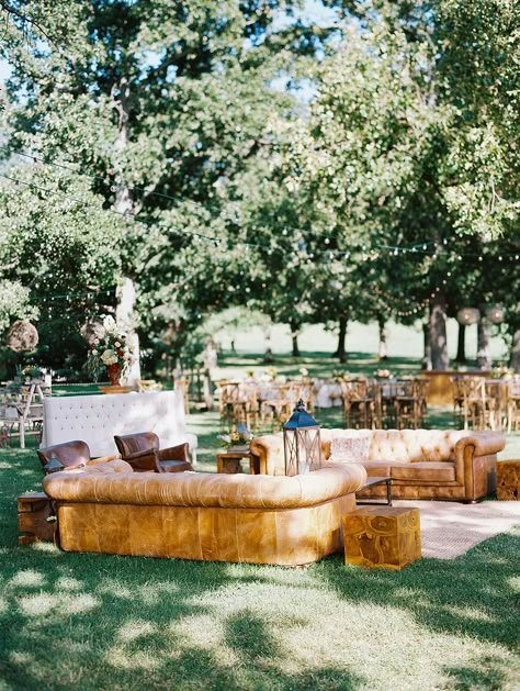 Who knew Arkansas had such a sprawling Italian community? Caroline and Blake wed in a classic Cathedral with an outdoor reception for 500 wedding guests to follow! With a plethora of lounges featuring upholstered furniture, a whole bunch of lush centerpiece ideas, a striped gelato cart and an entertaining live band beneath the stars, this is one wedding you will not soon forget! Head to #ruffledblog to see all the special details incorporated for the huge guest list! Couches For Wedding Reception, Outdoor Wedding Lounge, 500 Guest Wedding Reception, Casual Seating Wedding, Live Band Wedding Reception, Casual Wedding Seating, Leather Wedding Decor, Live Band Wedding, Outdoor Wedding Seating