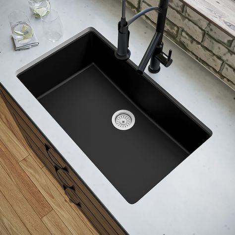 With its enormous extra-large bowl, this design is both practical and elegant. Its quartz composite material gives it outstanding durability and will provide years of trouble-free use. This undermount design is available in a selection of 6 rich color choices to compliment any décor. Karran Undermount 32.25-in x 19.25-in Black Quartz Single Bowl Kitchen Sink | QU-812-BL Big Sink Kitchen, Quartz Sink Kitchen, Deep Kitchen Sink, Kitchen Sinks Ideas, Black Undermount Kitchen Sink, Deep Sink Kitchen, Kitchen Sink Black, Large Kitchen Sinks, Composite Kitchen Sinks