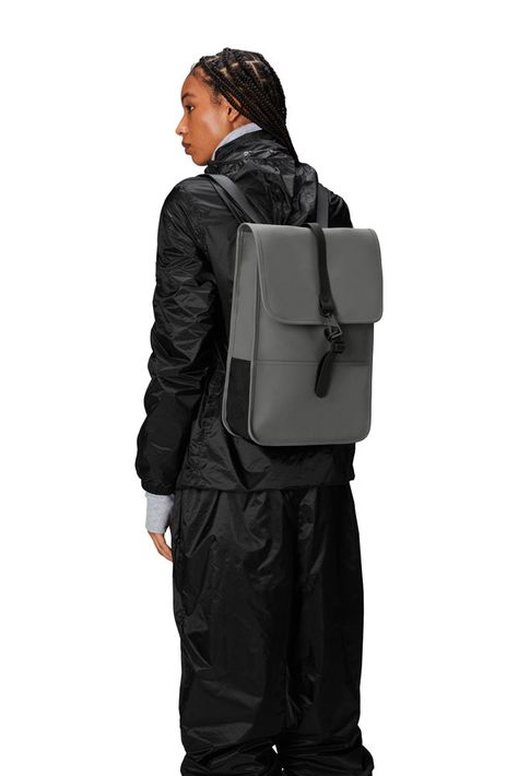 Backpack Mini is cut in Rains signature waterproof PU fabric, engineered for carrying strength, durability, and a smooth feel. Rains Backpack, Dark Cool, Pu Fabric, Classic Backpack, Timeless Accessories, Laptop Pocket, Daily Essentials, Carry On, Green And Grey