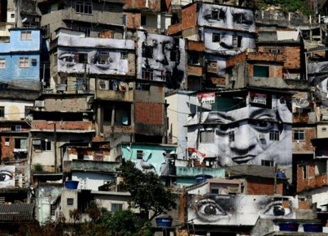 An artist named JR paints these kinds of murals in favelas of Brazil... he also started to paint them in other cities as well... I think its a great concept of are for inner city youth... — Favelas Brazil, The Hills Have Eyes, Jr Art, French Street, Best Street Art, Nina Simone, Yayoi Kusama, Street Art Graffiti, Land Art