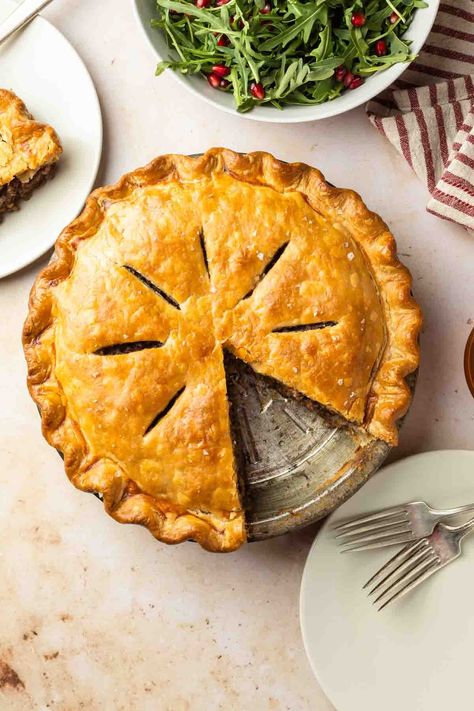 Originating in Quebec, Tourtiere is a traditional French Canadian Christmas recipe. Learn how to make this meat pie with flaky crust and hearty filling, just in time for the holidays. Tortiere Recipe, French Canadian Meat Pie Recipe, Canadian Meat Pie Recipe, Canadian Meat Pie, French Meat Pie, Canadian Christmas, Meat Pie Recipe, French Canadian, Fat Loss Foods